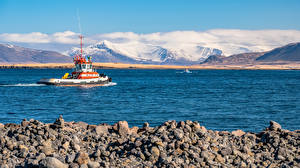 Fotos Island Gebirge Meer Motorboot Natur