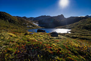 Hintergrundbilder Norwegen Lofoten Gebirge See Sonne