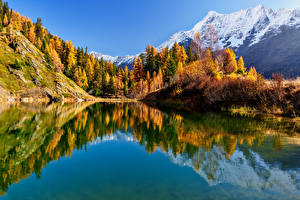 Картинка Швейцария Гора Озеро Пейзаж Альпы Отражение Valais Природа