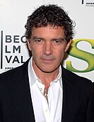 Antonio Banderas in a black suit