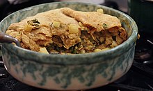 A clam pie prepared with curry spices