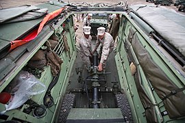 USMC M327 transported internally by an amphibious assault vehicle