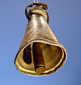 An improvised cowbell used for sheep or goats. The bell was found in 1988 in a field near Tuqu' (Tekoa) in the Judean hills, the West Bank. The bell's body is made of aluminum, probably a broken kitchen utensil, while the clapper is a brass cartridge case.