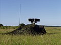 Ozelot air defence weapon carrier with camouflage in firing position