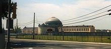 A large cream-colored prison building