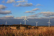 Aseriaru wind turbines next to fields