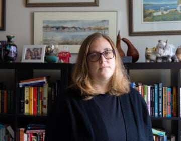 Alaina Johns, a patient that manages medication for multiple conditions, at her home in Philadelphia. (Kimberly Paynter/WHYY)