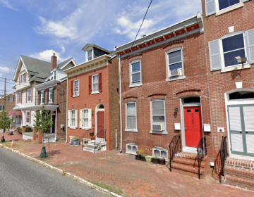 Several row homes on one side of a block