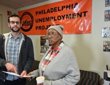 Adam Goldman, executive director of the Philadelphia Unemployment Project, left, with volunteer Jacqueline Chapman in their office