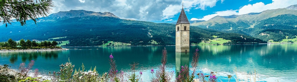 bell-tower-of-the-reschensee-resia-south-tyrol-italy-shutterstock_314553227-2