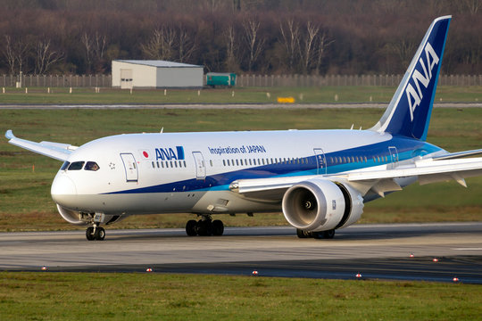 DUSSELDORF, GERMANY - DEC 17, 2015: All Nippon Airways (ANA) Boeing 787 Dreamliner airliner plane taxiing on Dusseldorf airport after landing.