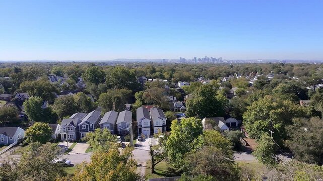 Nashville, Tennessee, Aerial View of Residential Neighborhood with City Skyline