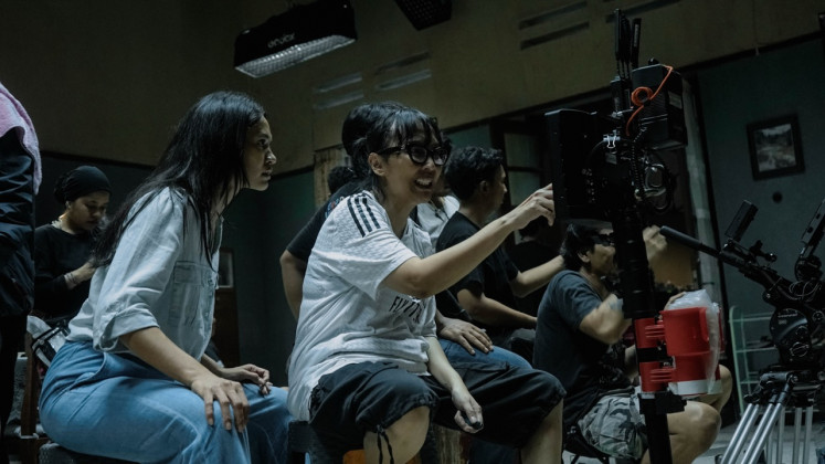 Vision of terror: Writer-director Upi (center) has been at the helm of a number of iconic Indonesian films, including “30 Hari Mencari Cinta“, “Serigala Terakhir“, “Belenggu“ and “My Stupid Boss“, among others.