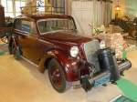 Opel Olympia mit Holzgasanlage, Auto & Uhrenwelt Schramberg, 6.3.11  Baujahr 1936  20 PS aus 1285 ccm  60 km/h schnell  Die Holzgasanlage vom Typ Zenker wurde 1946 nachgerüstet.