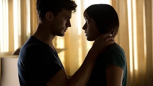 Dakota Johnson and Jamie Dornan in Fifty Shades Of Grey (2015)