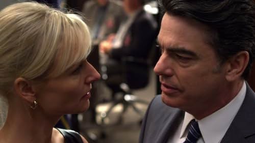 Peter Gallagher and Kari Matchett in Covert Affairs (2010)