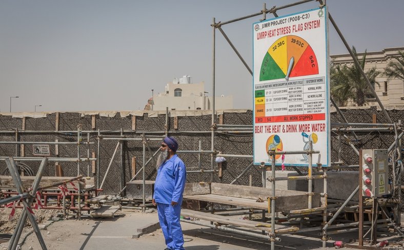 Heat stress notice at construction site, Qatar