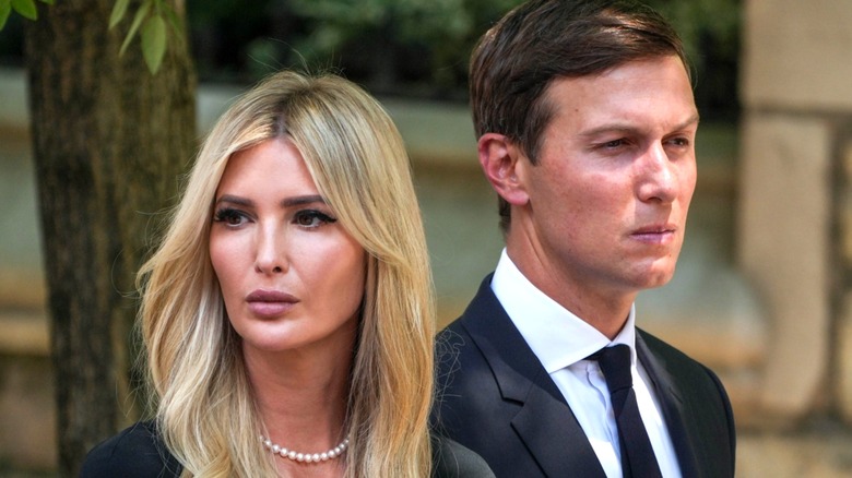 Ivanka Trump and Jared Kushner looking away from each other.