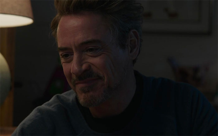 Tony Stark face in a dark room