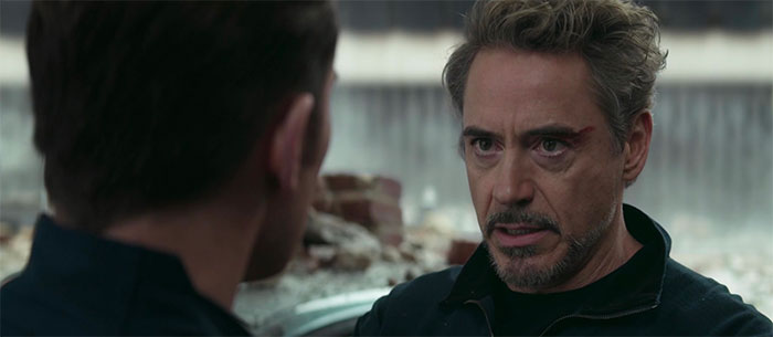 Tony Stark is talking with a man