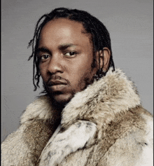 a man with braids wearing a fur coat