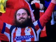 a man with a beard is wearing a azerbaijan jersey