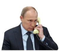 president putin is talking on a yellow telephone .