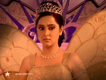 a woman wearing a tiara and wings is on a website called startv.in