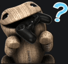 a stuffed animal is holding a video game controller in its mouth and has a question mark above it