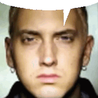 a close up of eminem 's face with a speech bubble above it