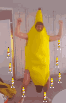 a man in a banana costume is surrounded by bananas that say " i love you "