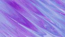 a purple and blue marbled background with bubbles in it