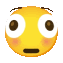 a yellow smiley face with big eyes and a surprised look on his face .