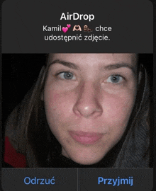 a screenshot of a woman 's face with the words airdrop written above it