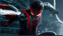 a close up of a spider man in a black and red costume