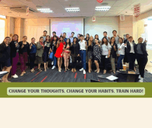 a group of people are posing for a photo with the words change your thoughts change your habits train hard