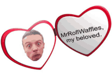 a heart shaped mirror with a man 's face and the words mrroflwaffles my beloved on it