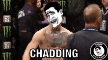 a shirtless man with a tattoo on his chest is standing next to a man in a black suit and says chadding .