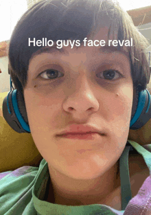 a close up of a person 's face with the words hello guys face reveal