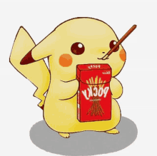 a pikachu holding a box of pocky sticks in its mouth