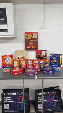 a table full of snacks including fox 's macaroons