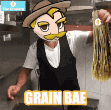 a man holding a broom with the words grain bae written on it