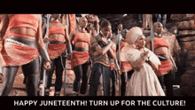 a group of people are standing in front of a stone wall with the words happy juneteenth turn up for the culture