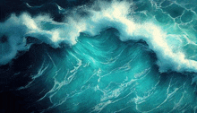 an aerial view of a large ocean wave crashing on the shore .