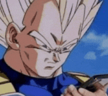 a close up of a dragon ball z character looking at a cell phone