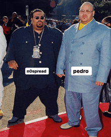 two men in suits are standing next to each other and one has the name pedro on his shirt