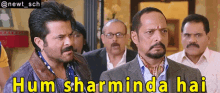 a group of men standing next to each other with hum sharminda hai written on the bottom