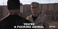 a man in a military uniform says you 're a fucking animal to another man