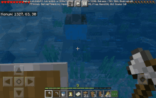 a screenshot of a minecraft game with a cross in the water