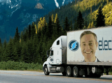 a truck with a man 's face on it and the word elec on the side